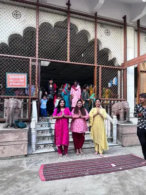 Pilgrim group standing at a temple entrance on a Mathura Vrindavan tour