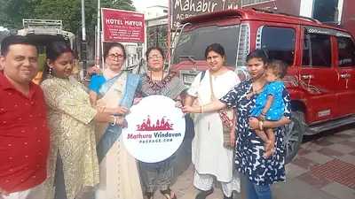Happy family group with Mathura Vrindavan Package board near our taxi
