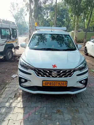 White Maruti Ertiga taxi used for Mathura Vrindavan darshan tours