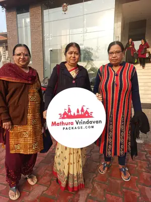 Women travellers with Mathura Vrindavan Package board outside hotel