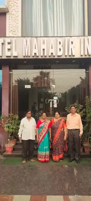 Family at Hotel Mahabir Inn entrance Mathura